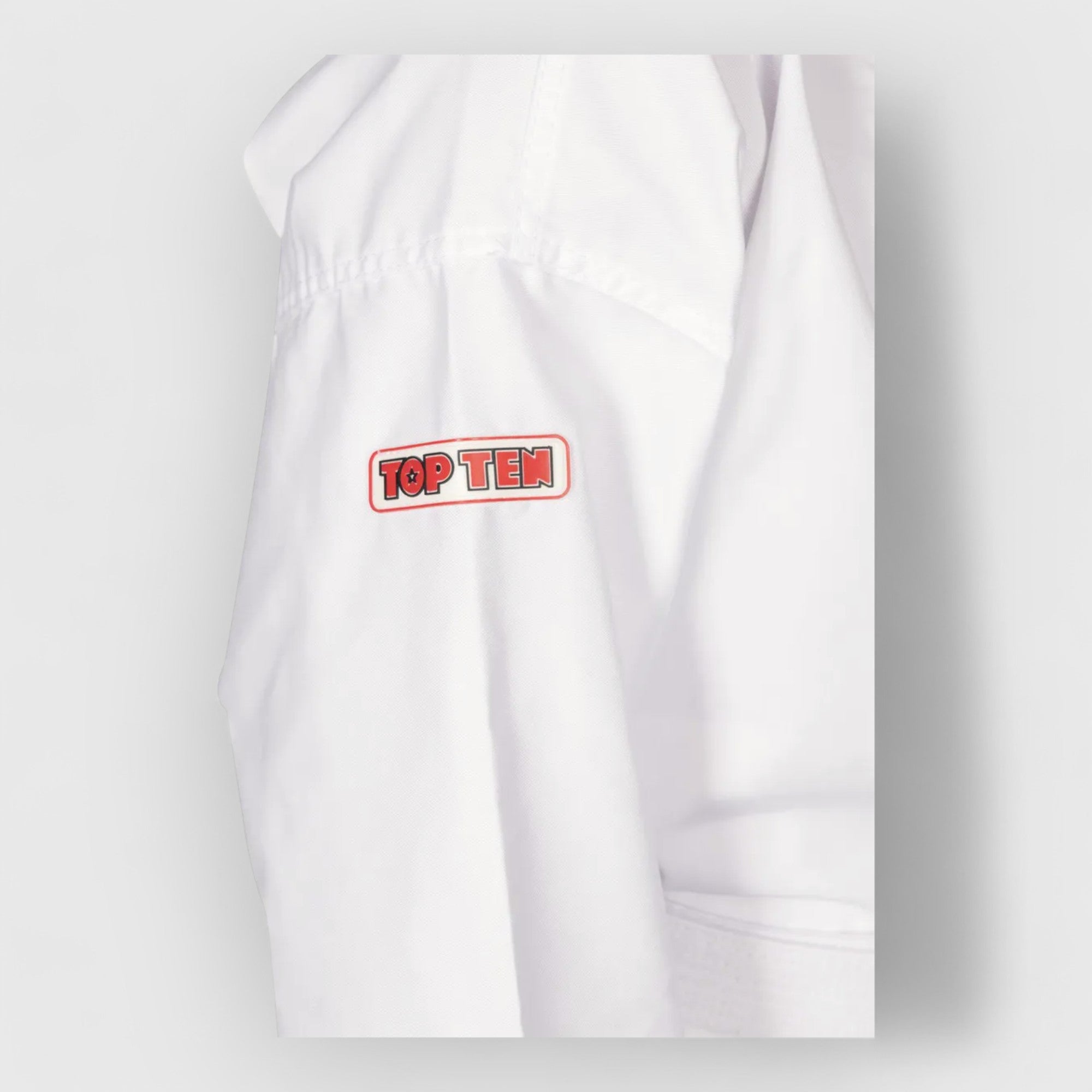 TOP TEN Elite Kyong ITF Nybegynnerdrakt for voksne (ITF godkjent - CombatStore.no